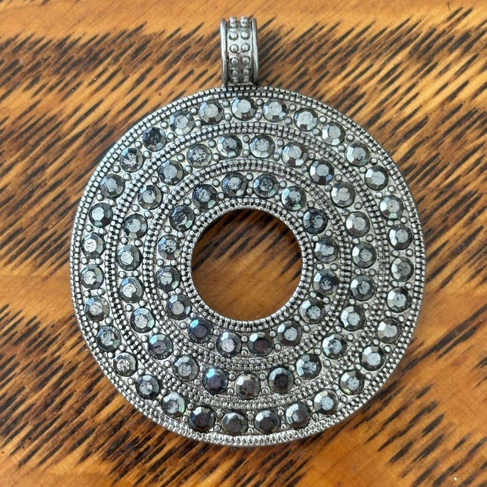 Elegant Silver-Tone Circular Pendant